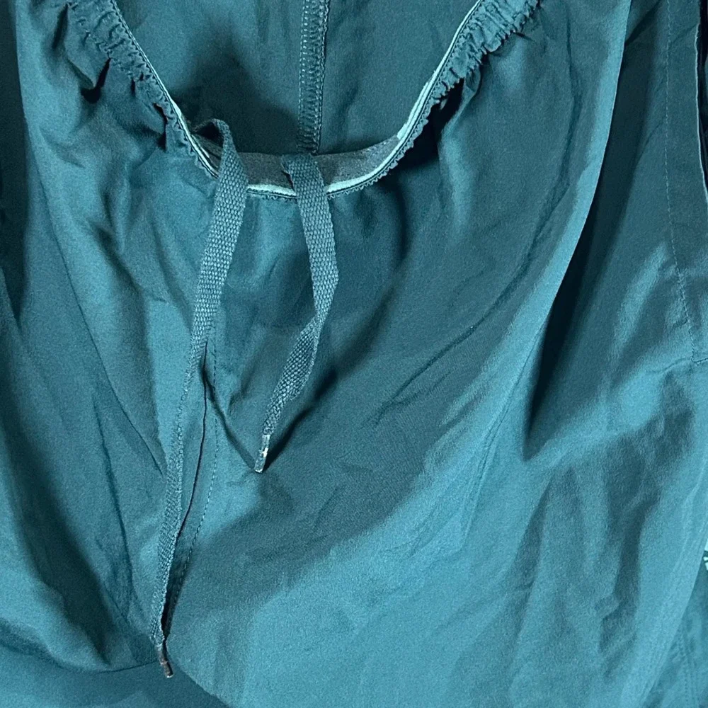 Under Armour HeatGear Mens XL Teal Green Graphic Loose Fit Athletic Shorts